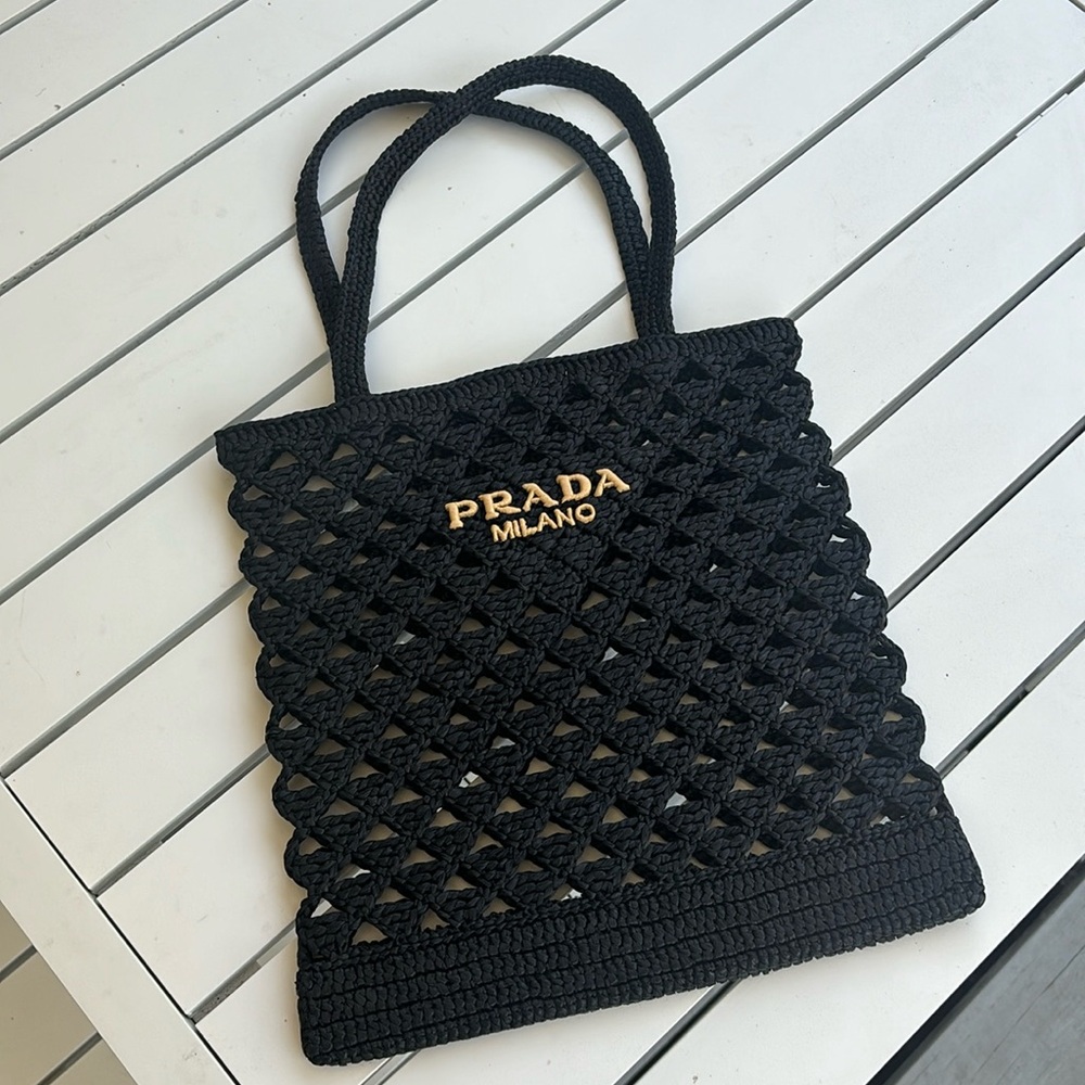 BRAND NEW Prada Crochet bag. Received as a gift and doesn’t fit my style.